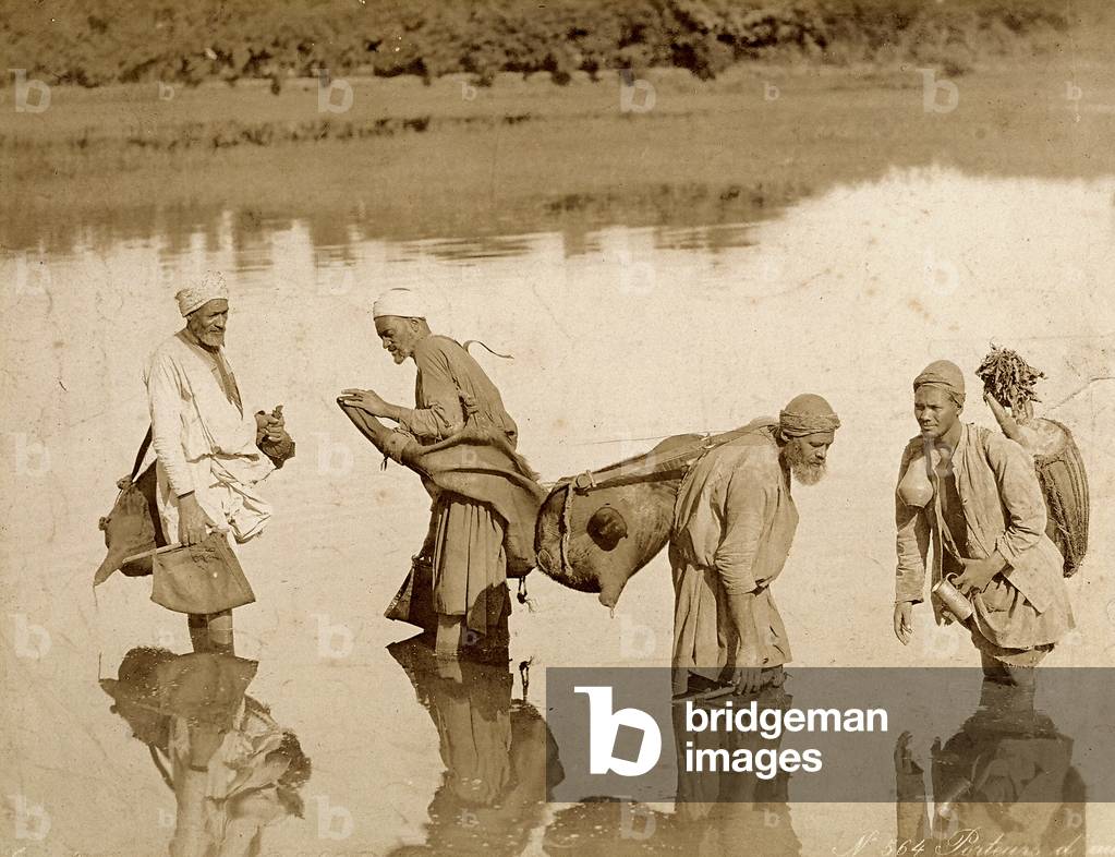 Egyptian water carriers in a river, 1880 (print on double-weight paper)