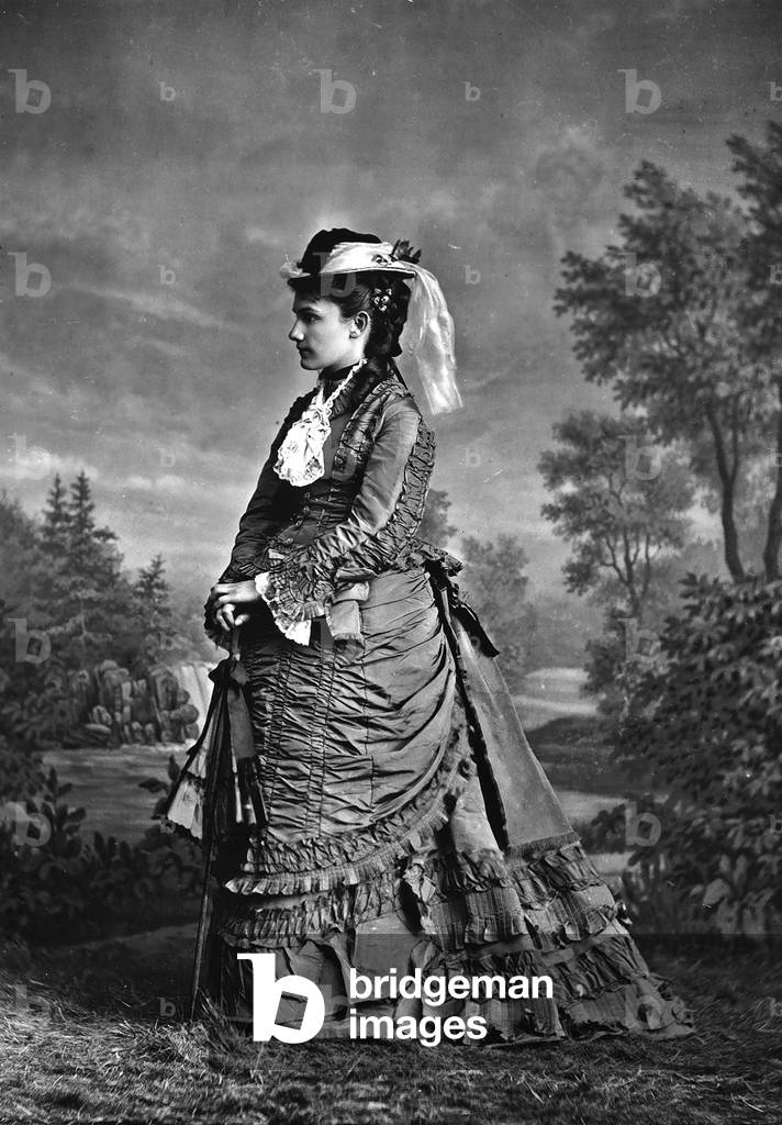 Portrait of lady in elegant day dress