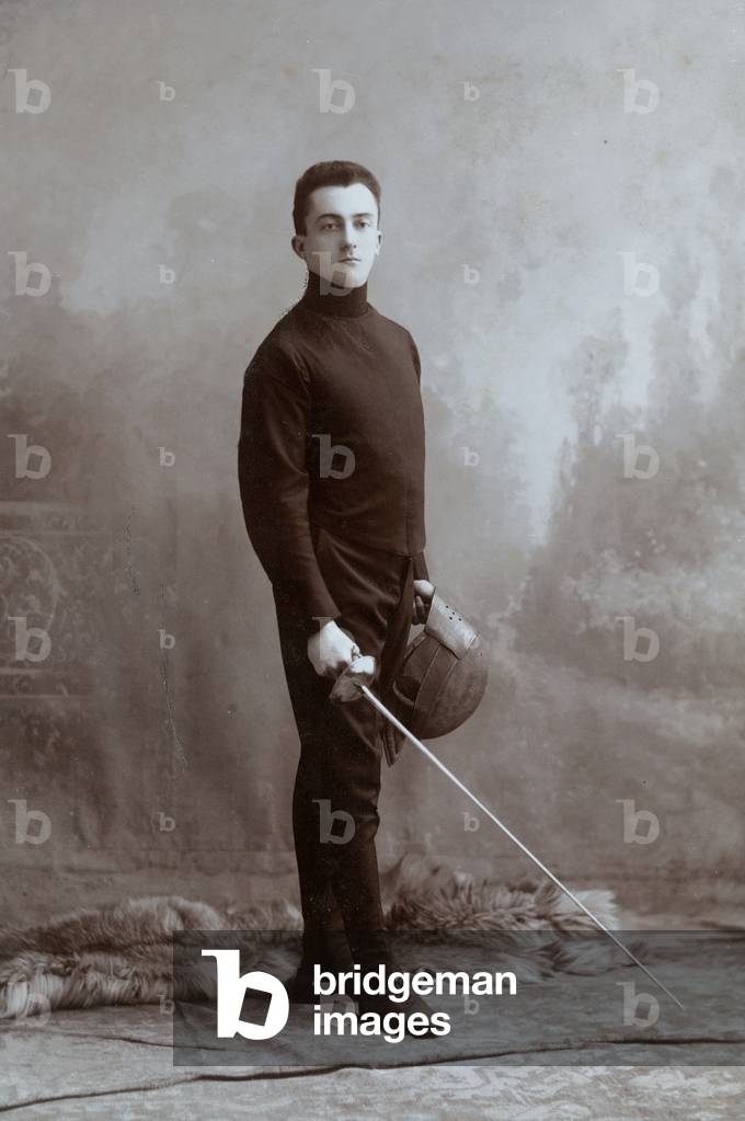 Portrait of a man with a foil