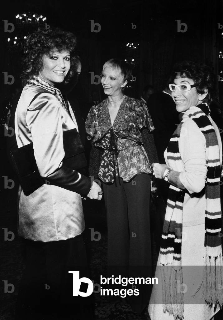 The director Lina Wertmüller in the company of the actresses Claudia Cardinale and Mariangela Melato during an exclusive reception.