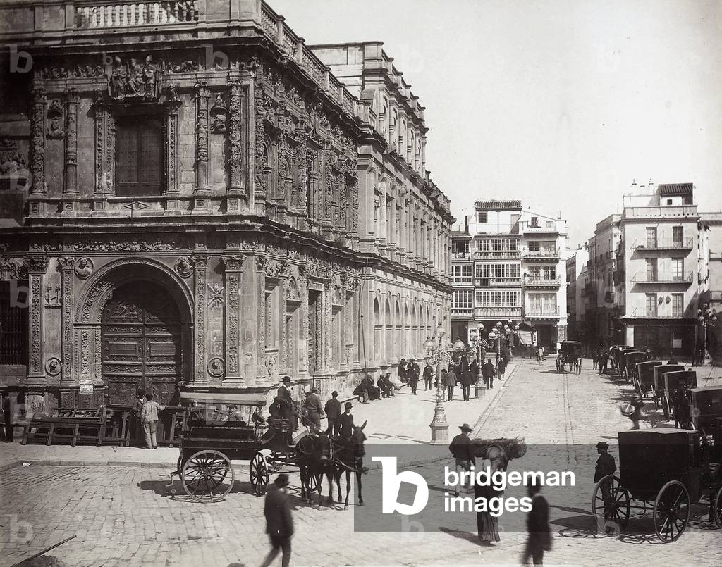 View with people of a street in Seville, Spain.