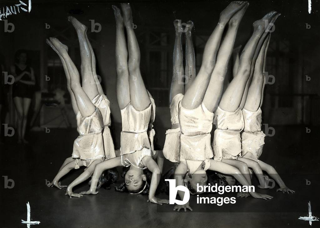Ballerinas at Irene Popard's dance school perform an acrobatic dance number.