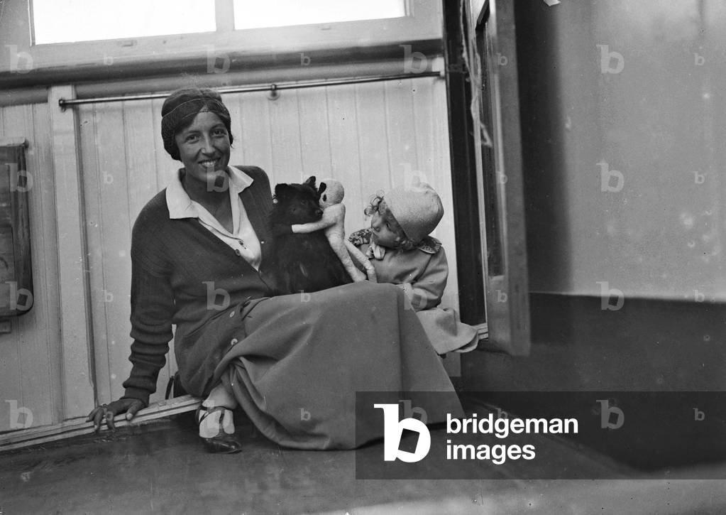 Portrait of a woman with child