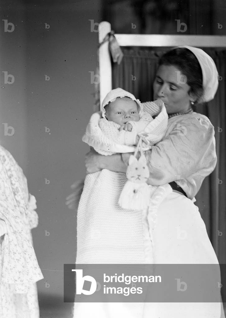Portrait child on the day of his baptism