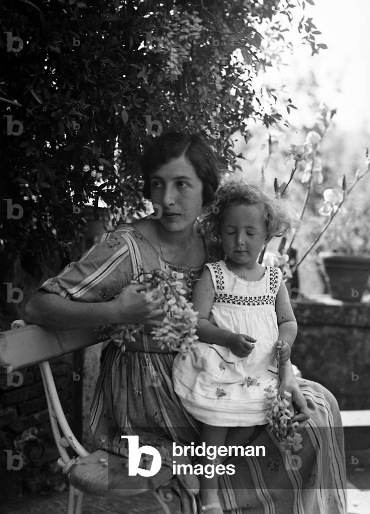 Portrait of a woman with child