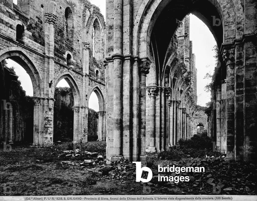 The ruins of two naves seen from the transept of San Galgano Abbey, near Siena, in Tuscany