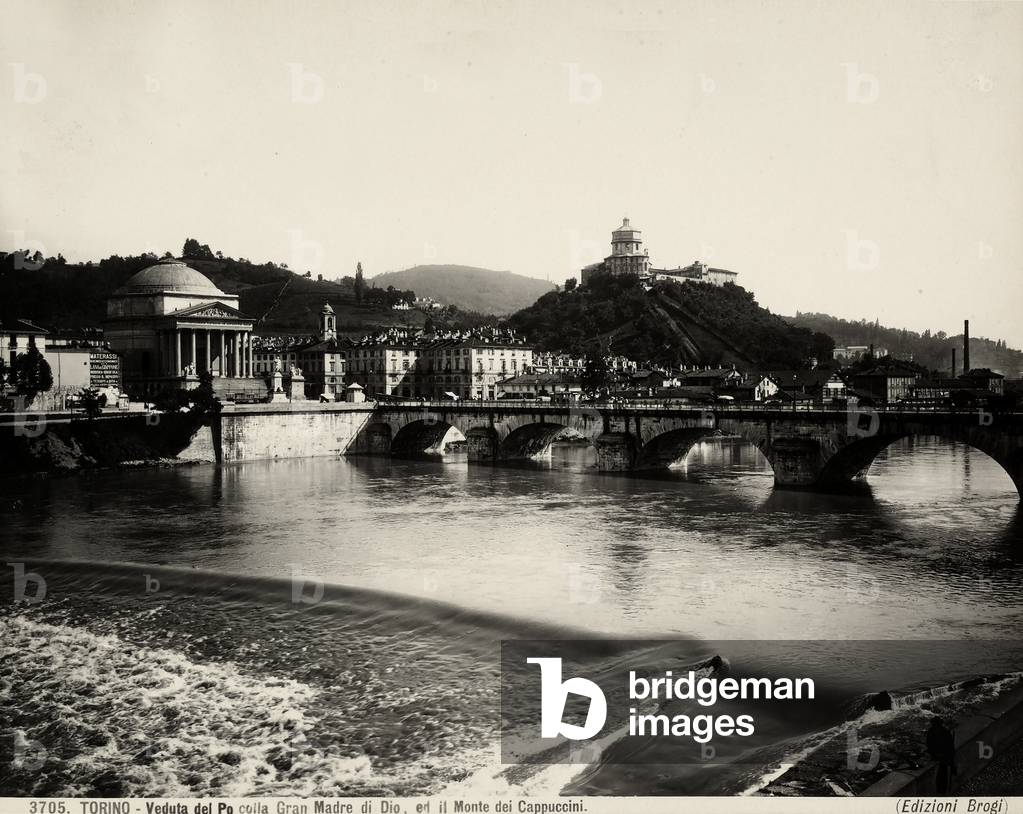 View of the Po river crossed by the Vittorio Emanuele I Bridge, and the Church of the Grand Madre di Dio at the end of it. On the right the Mountain of the Capuchins is visible with the Church of S. Maria del Monte., 1890 c., by Bonsignore, Ferdinando, 1827-1831., Turin (b/w photo)