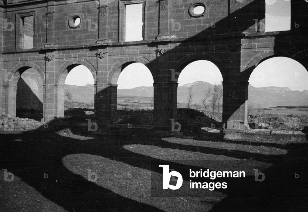 Spanish Civil War 1936-1939: Italian fascist soldiers pass through Jerez de la Frontera, Guadalajara, Almadrones, Navalpotro, Calamocha and Labastida to arrive in Santander. Remains of a building in Spain