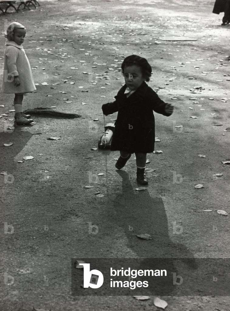 Girl playing with a toy train