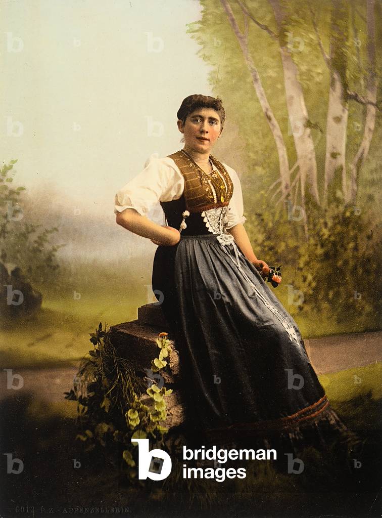 Portrait of a woman in traditional clothing, 1910 (photomechanic print)