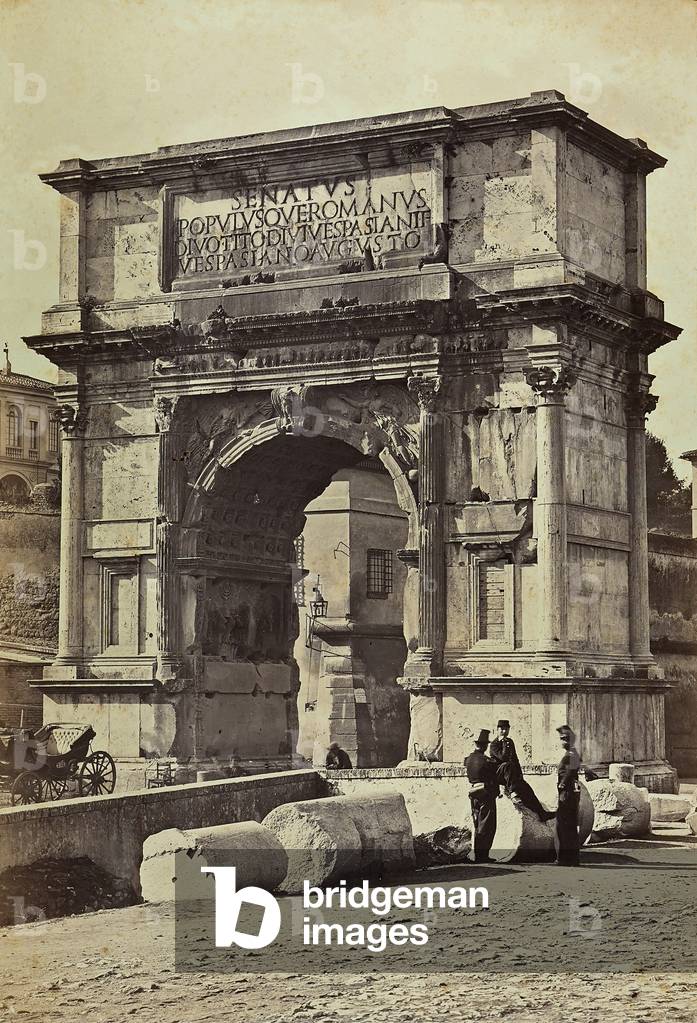 The Arch of Titus. Three soldiers stand next to the ruins