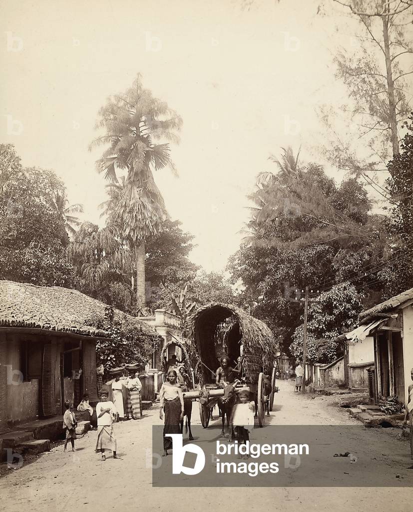 Cart with youths and young children in an Indian road
