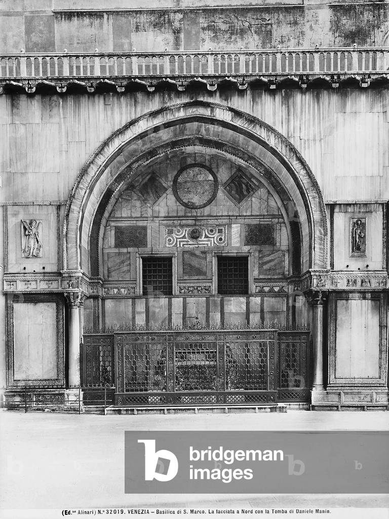 Archway of the north façade of St. Mark's Basilica in Venice, with the tomb of Daniele Manin