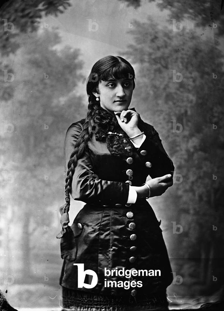 Portrait of woman with long plait