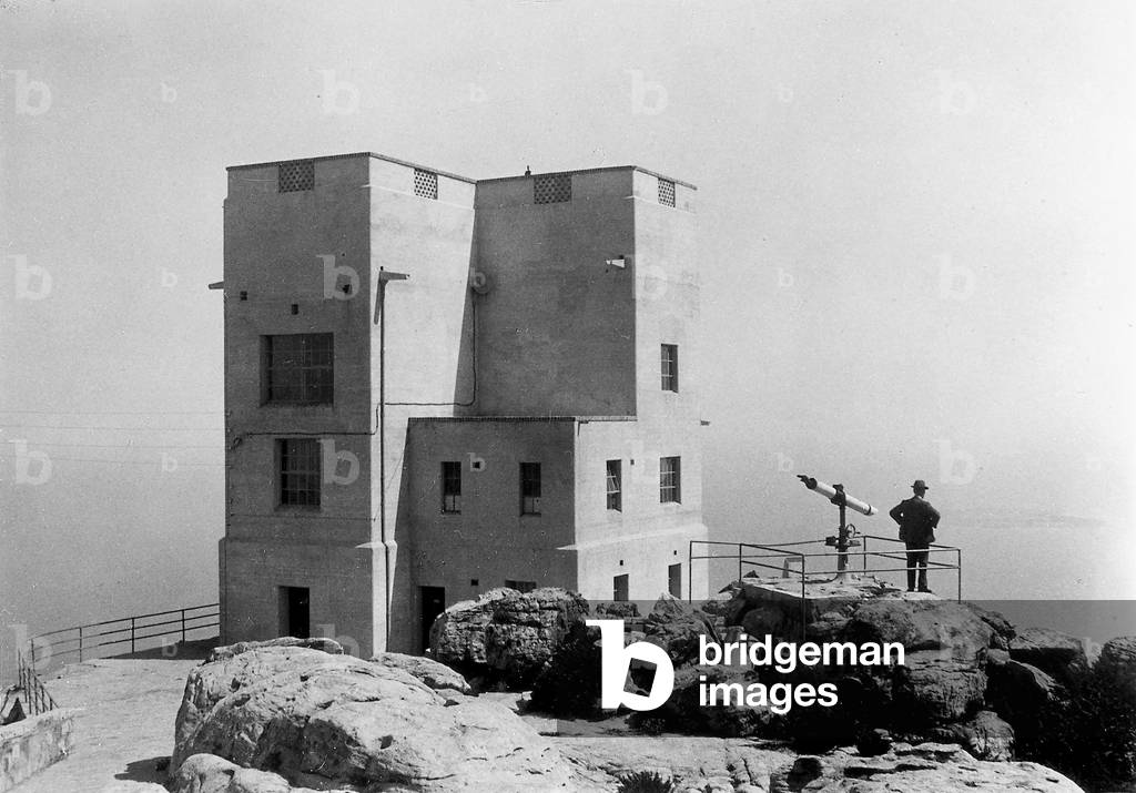 Man observing the view from the cableway station at Table Mountain, Capetown, Republic of South Africa