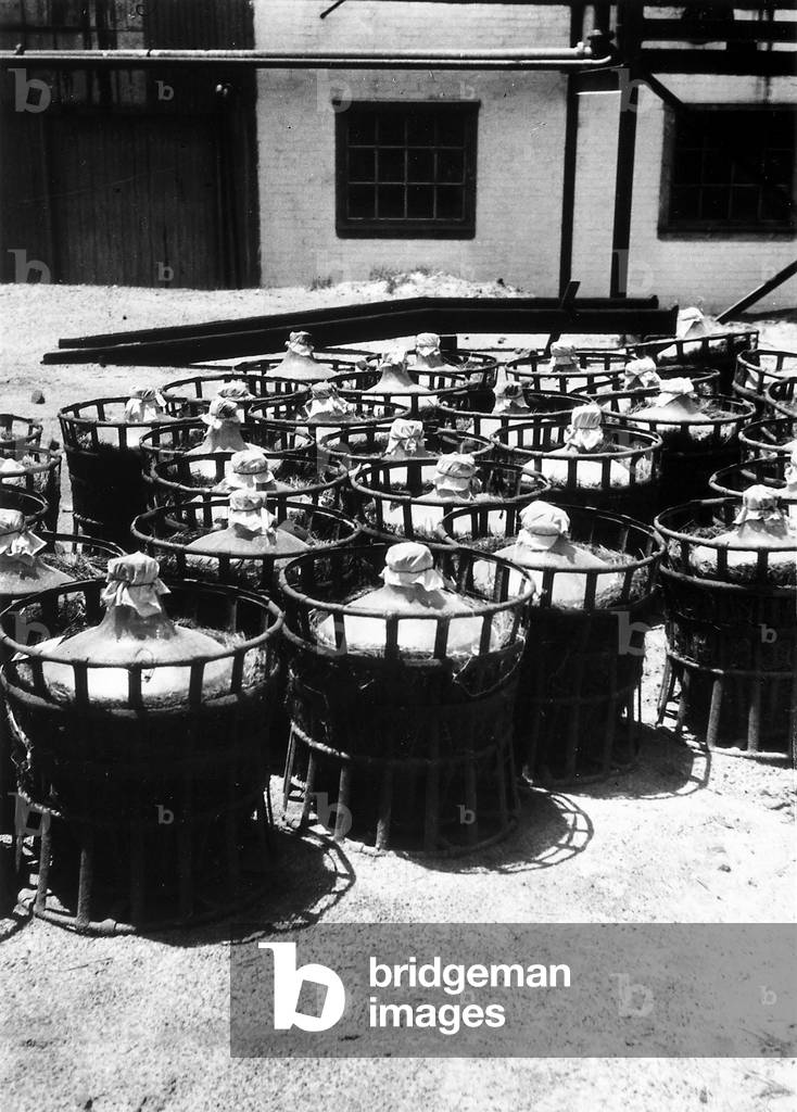 Demijohns of cyanide in the City Deep mine in Johannesburg (b/w photo)