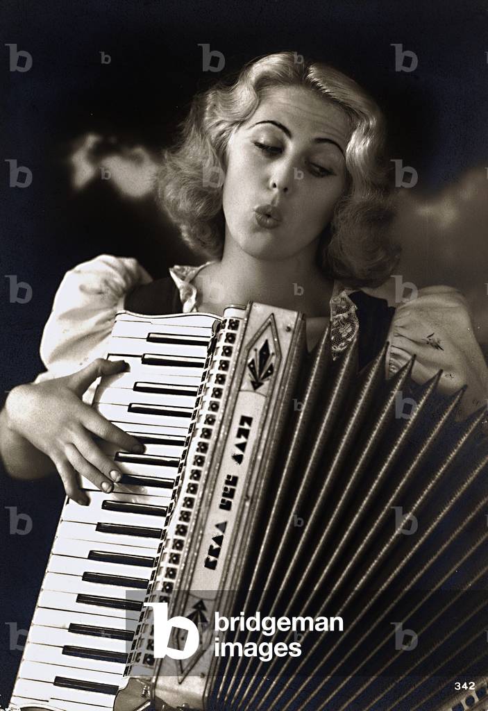 Woman with accordion, postcard