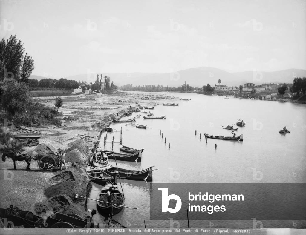 View of the River Arno taken by the iron bridge (now Bridge St. Nicholas) with sand diggers at work, Florence