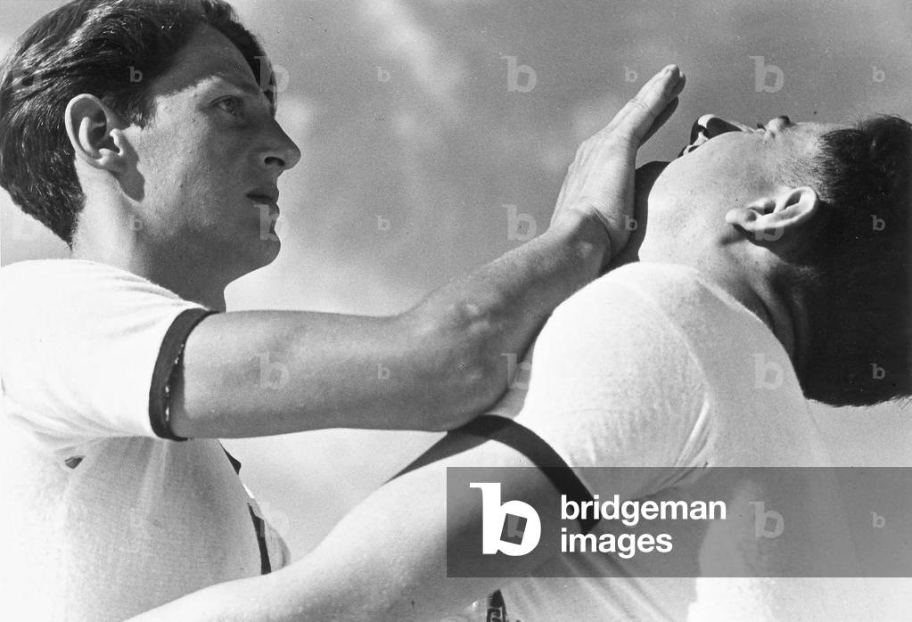 Two youths during a martial arts demonstration.