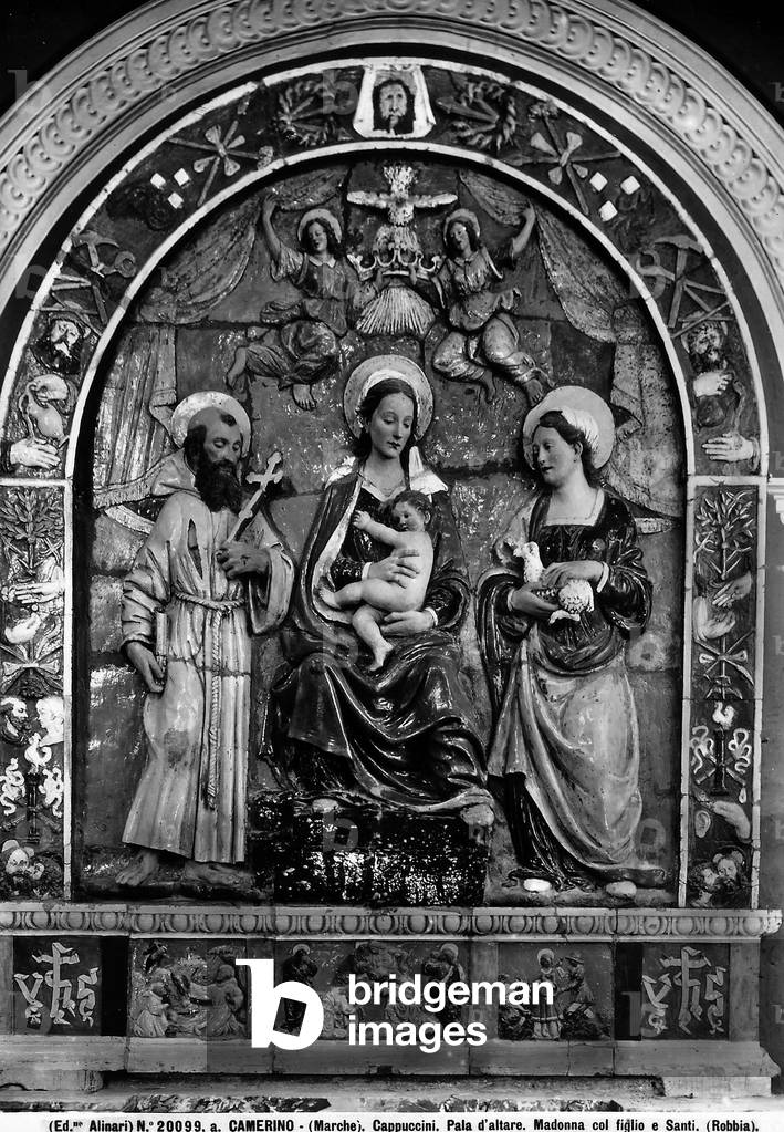 Glazed terracotta showing the Madonna enthroned with the Child between saint Francesco and Agnese, 