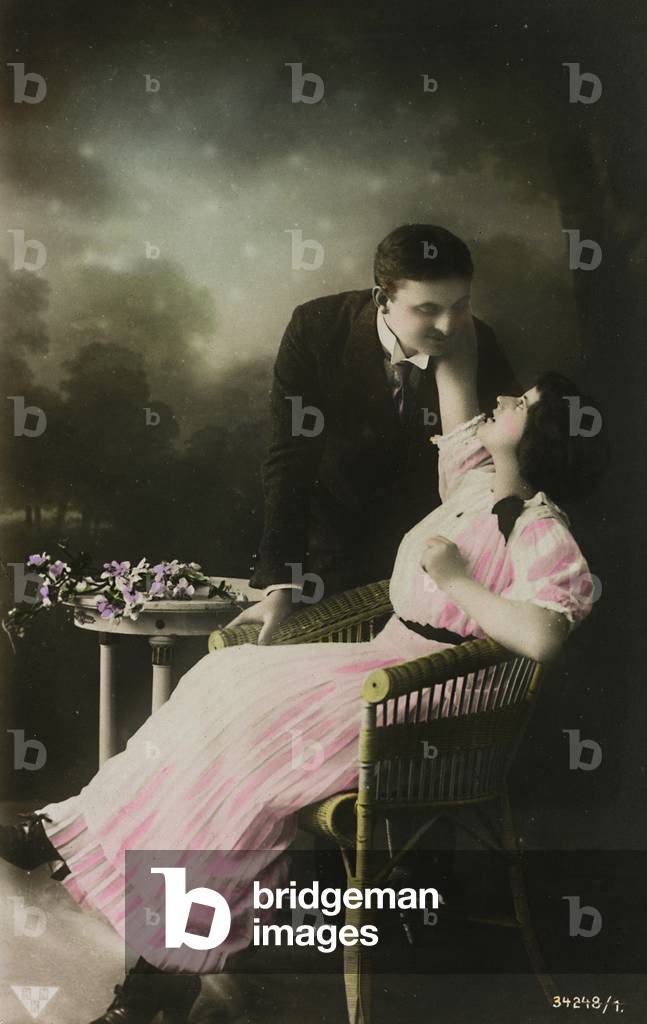 Postcard, portrait of a couple in a studio, 
