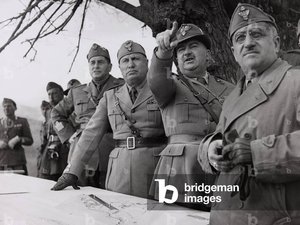 Benito Mussolini during an inspection on the front of Greece with General Ugo Cavallero, 06/1941 (b/w photo)