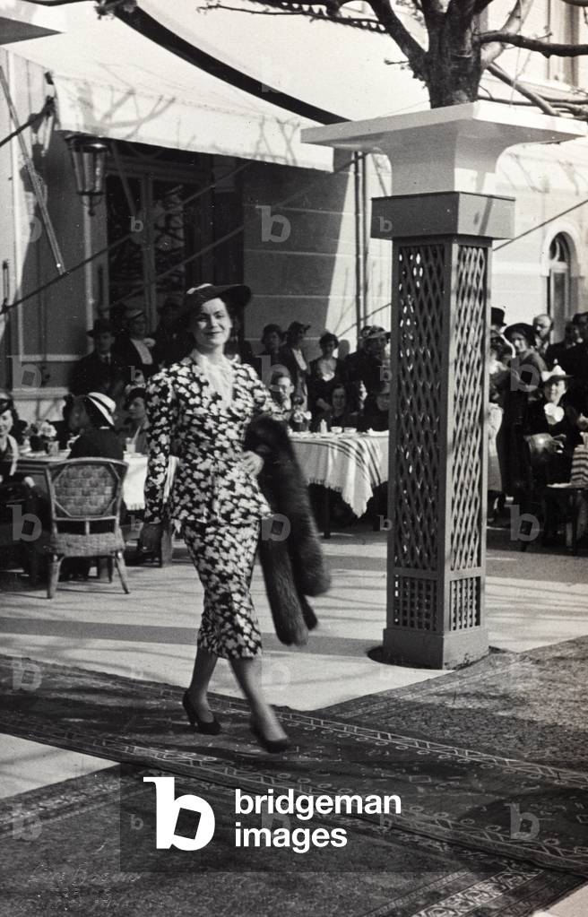 Model wearing a dress created by the couture house 