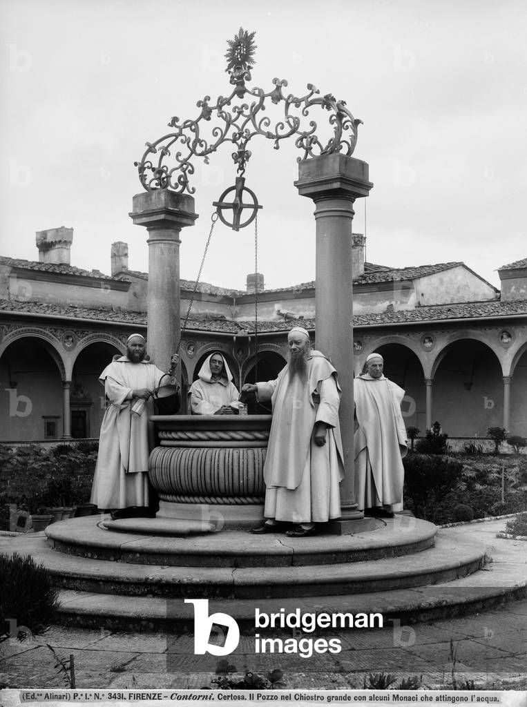 Some Carthusian monks seen at the well of the Large Cloister, in the Certosa (Carthusian Monastery) of Galluzzo, on the outskirts of Florence