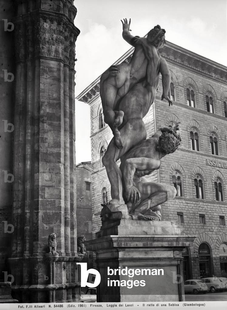 The statue of the Rape of the Sabine Women by Giambologna, in the background the Coffee 