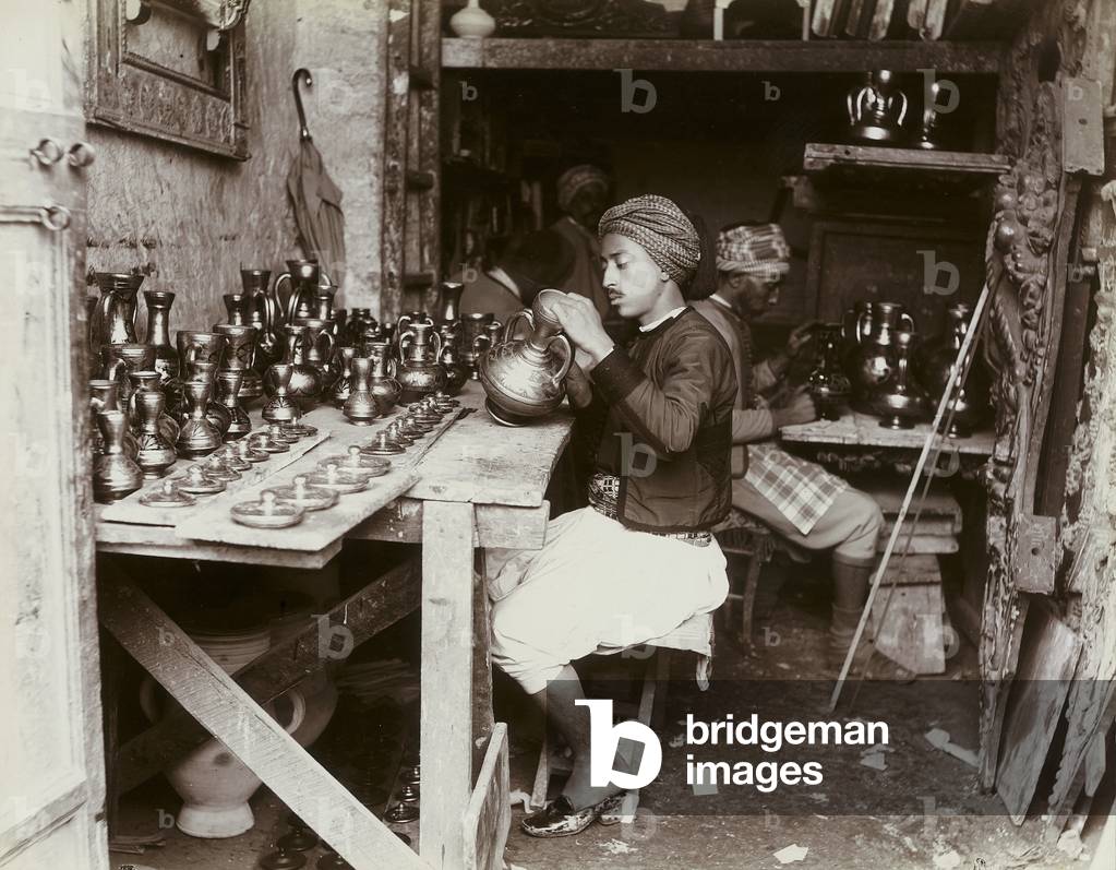 Some Turkish artisans photographed while decorating some metal pitchers, 1890 (print on double-weight paper)