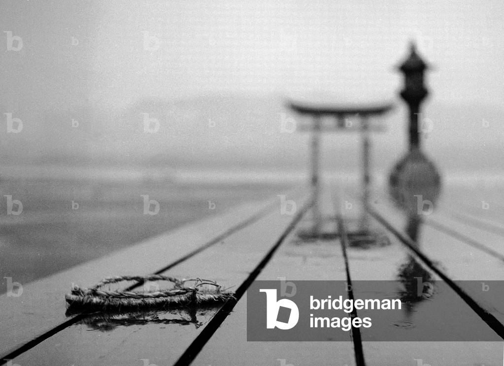 Rain and a forgotten sandal at the Miyajima Sanctuary, Japan (b/w photo)