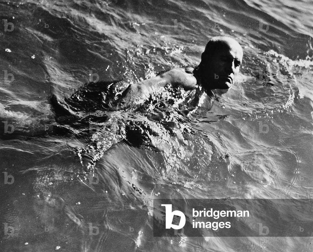 Benitio Mussolini, photographed while swimming, during a vacation in Riccione, in 1933 (b/w photo)