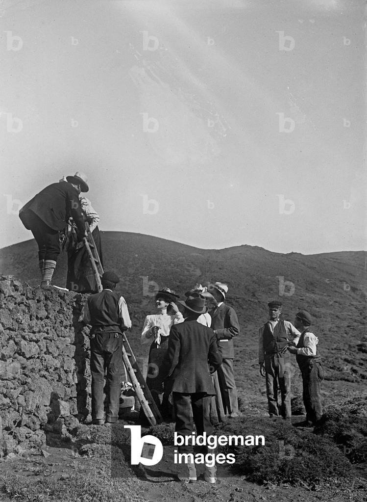 Group on a ladder during an excursion to Mount Etna