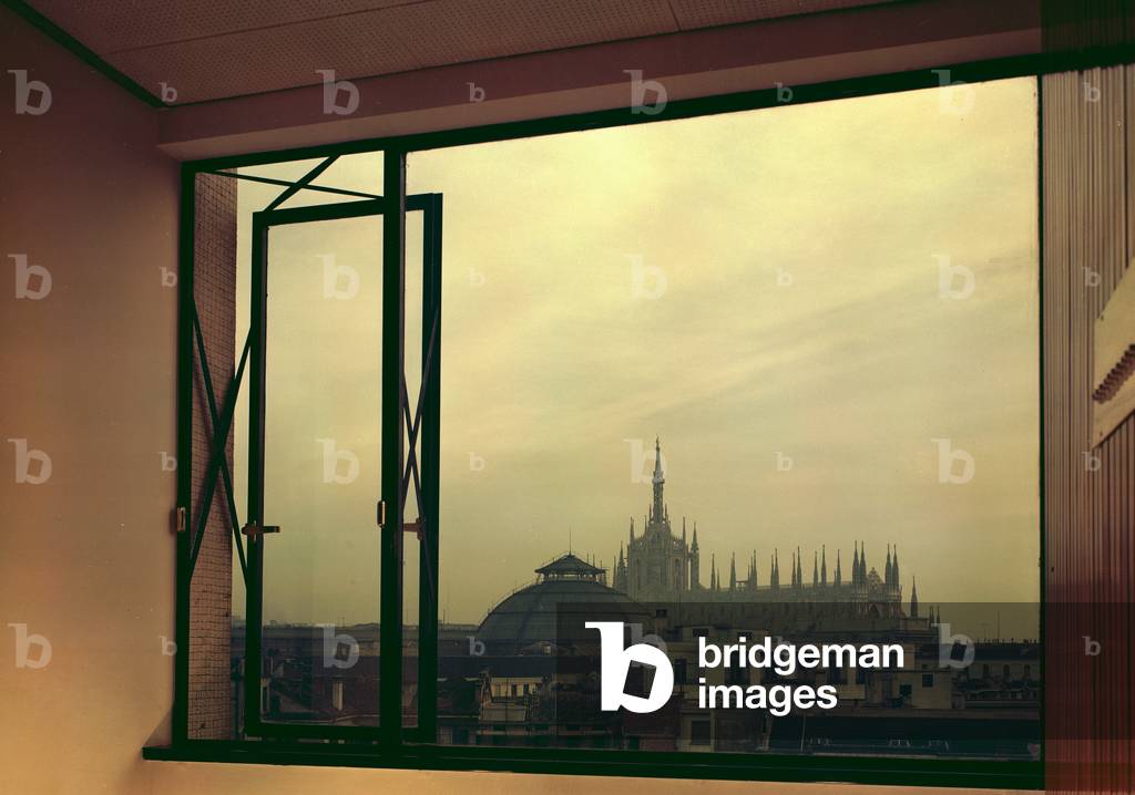 View of Milan Cathedral by a window with aluminum joinery firm of the Company Curtisa