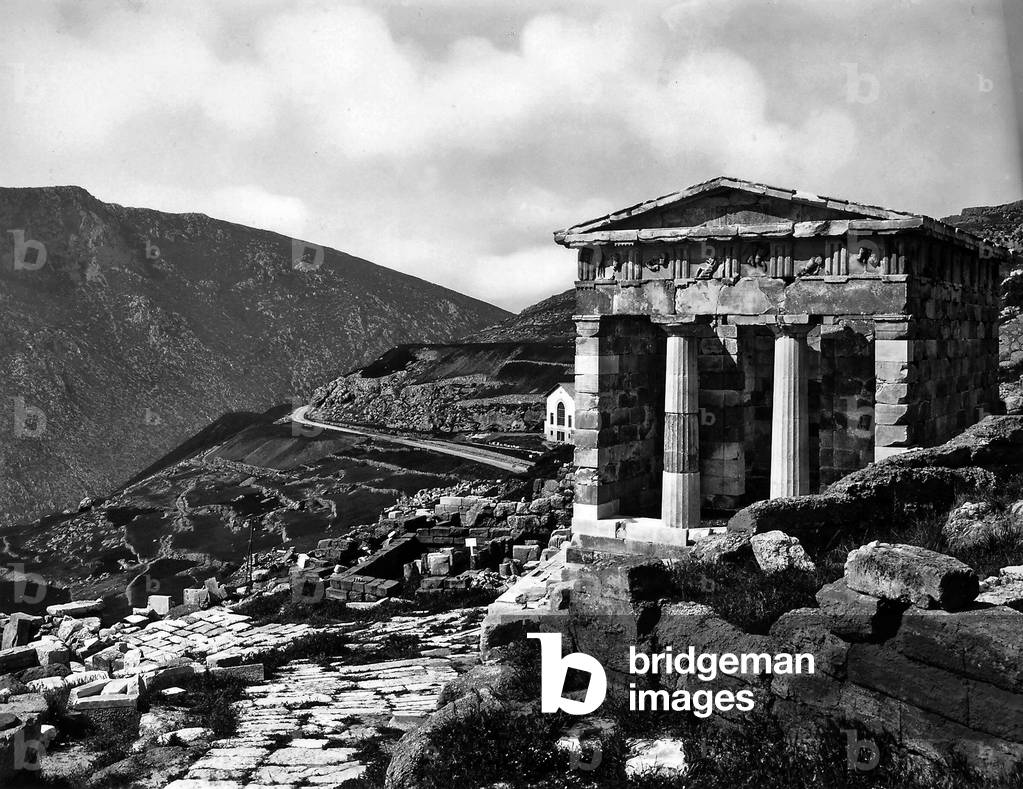 Photo showing the Treasure of the Athenians located in the Sanctuary of Delphi, Greece.