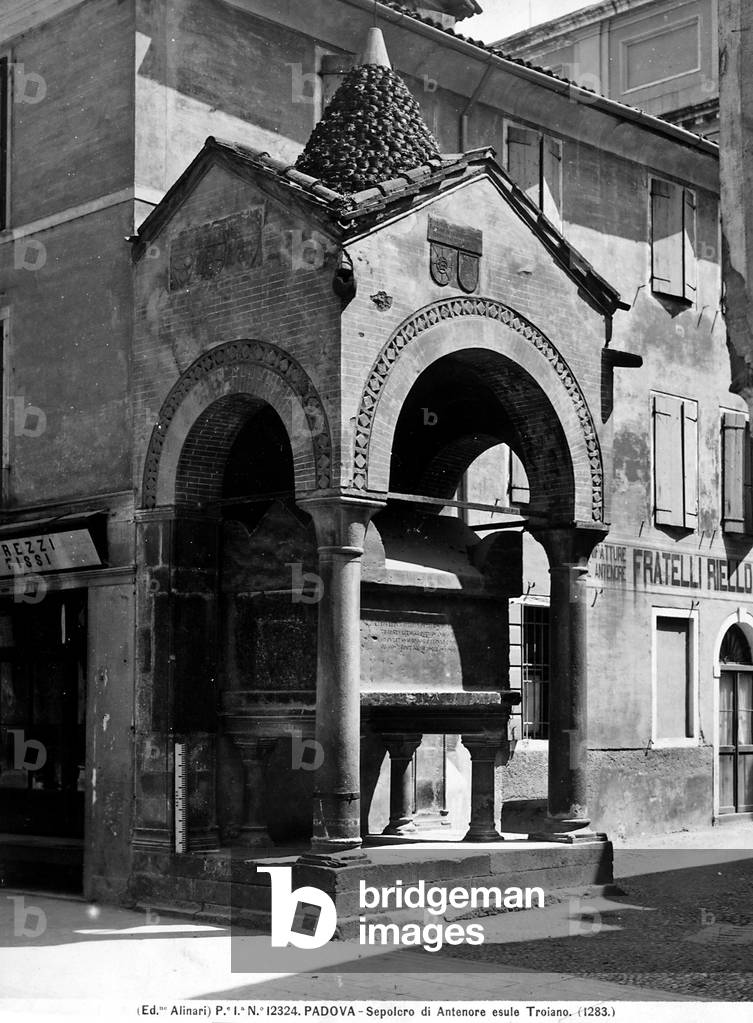 The Sepulchre of Antenor in Padua; the building is surrounded by houses.