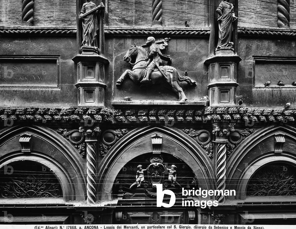 A detail of the Gallery of Merchants in Acona: the lunette contains a blazon held up by two putti and a high relief depicting St. George on horseback.
