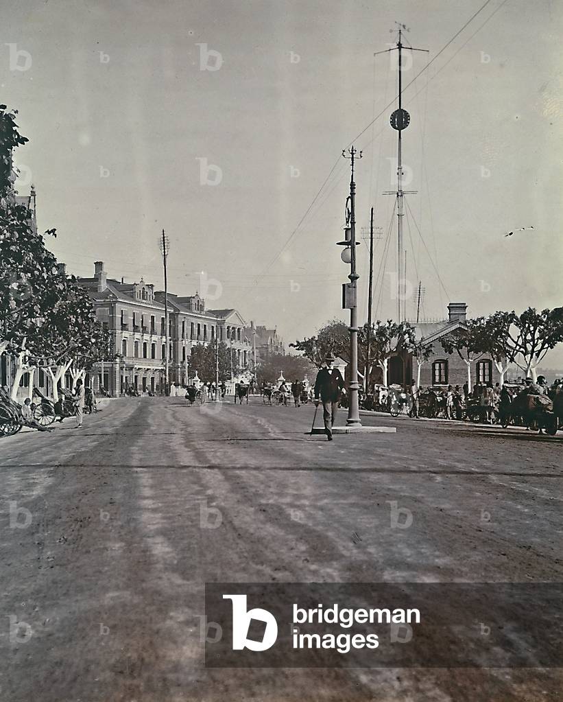 Rickshaw stopped on the side of a road in Japan