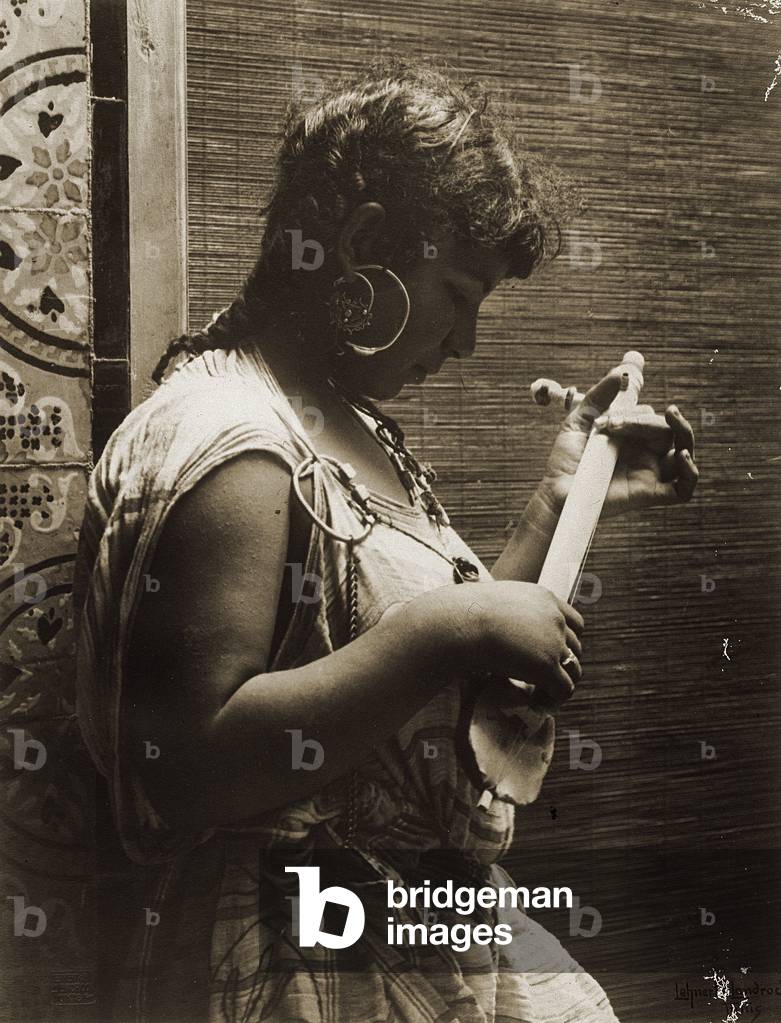 Tunisian musician (woman), 1910 (print on double-weight paper)
