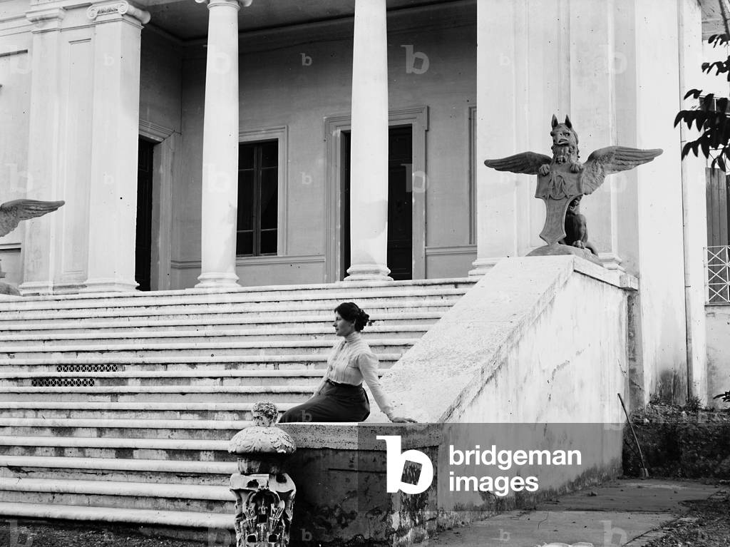 Portrait of a woman near a staircase in Catania
