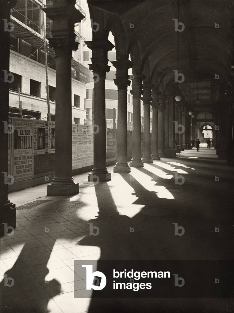 The arcades of Via Viotti at the side of the construction site for the construction of the Tower Littoria, Turin