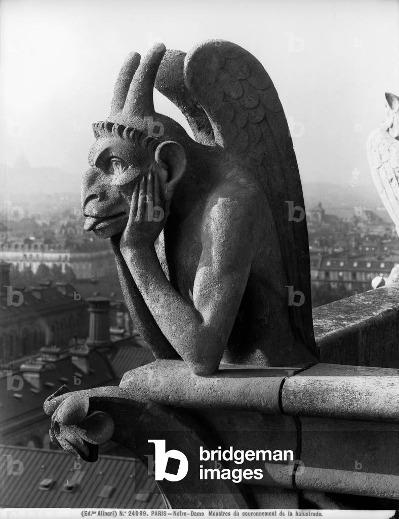 Detail of monstrous figures located on one of the two terraces in the Cathedral of Notre-Dame, Paris.