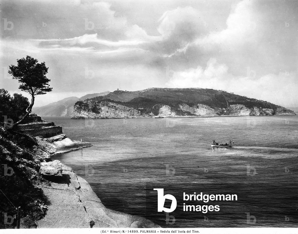 View of the island of Tino from the island of Palmaria, in the gulf of La Spezia. A boat is visible.