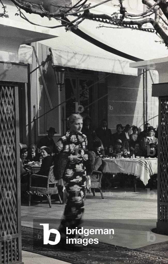 Model wearing a dress created by the couture house 