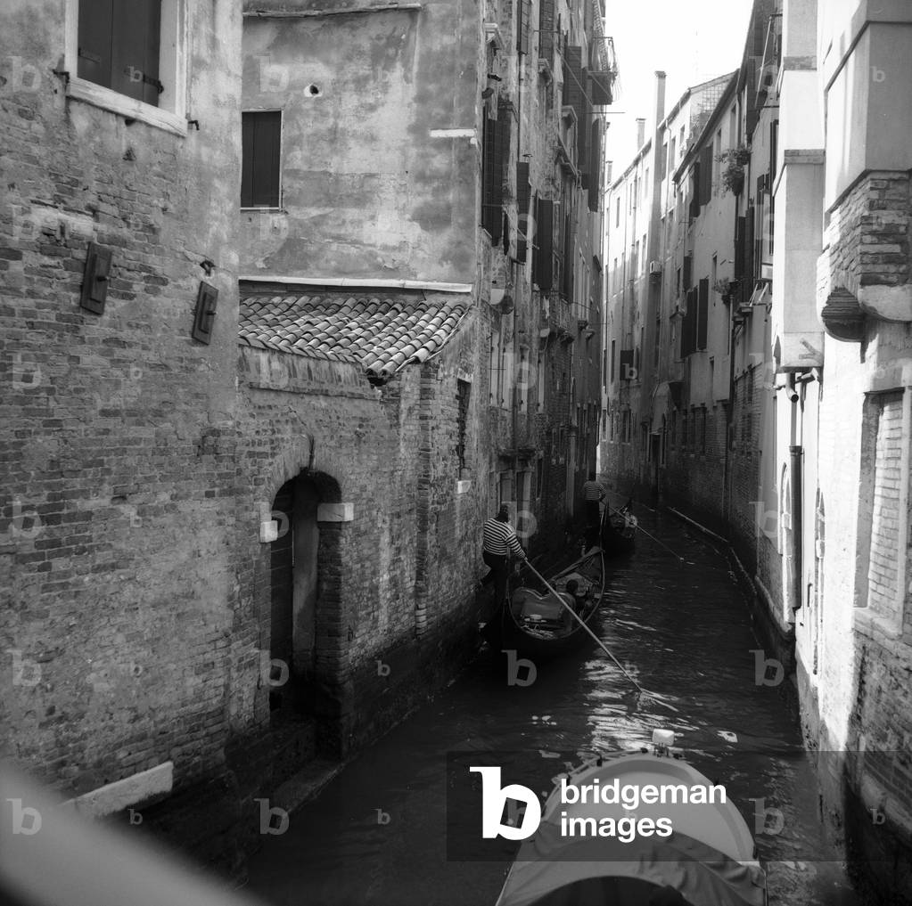 View of a canal in Venice (b/w photo)