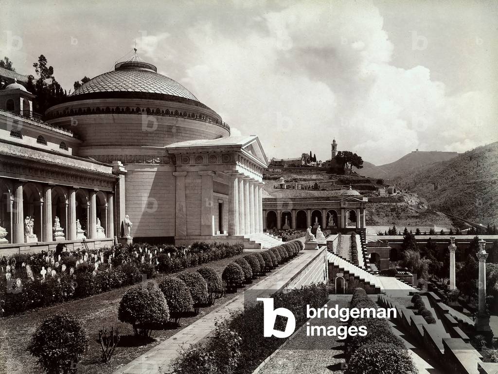 Detail of the interior of the monumental cemetery of Staglieno by the civic architect Giovan Battista Resasco, Genoa. The church and part of the gallery with memorial sculptures are visible.