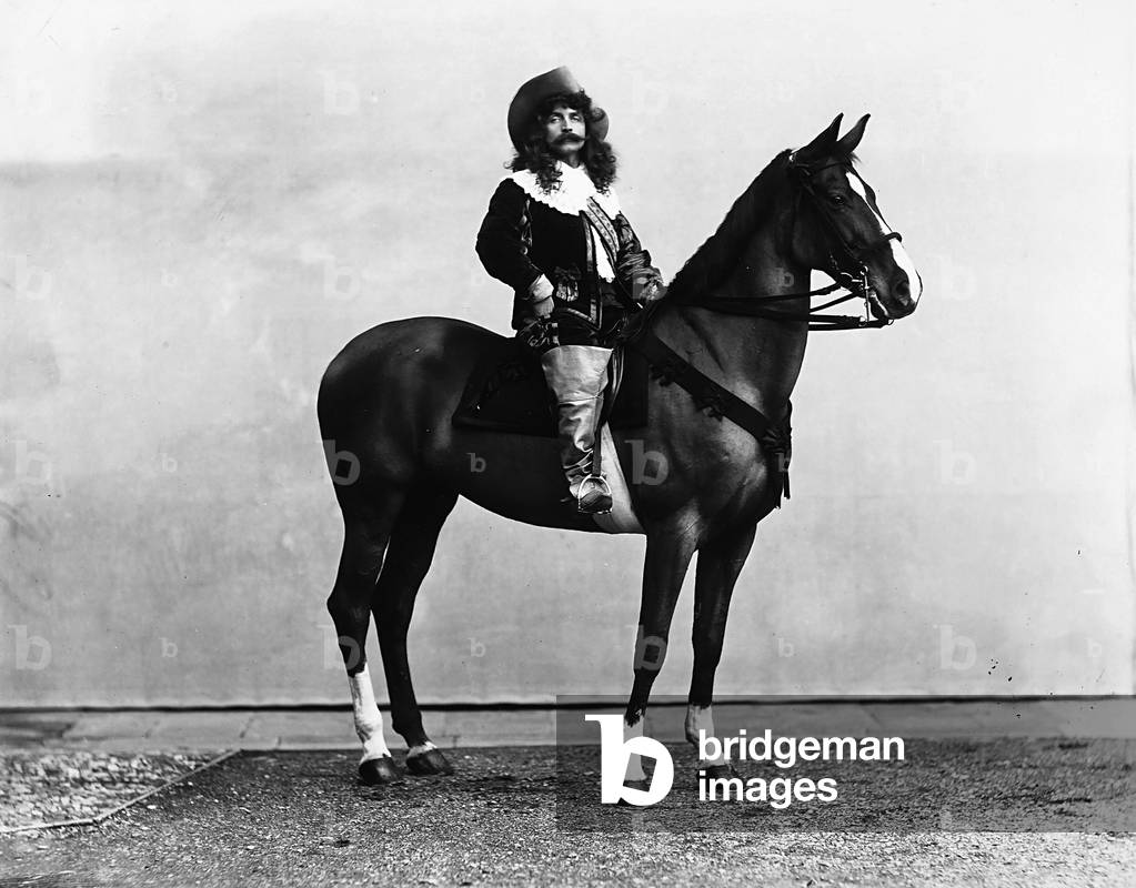 Captain Bonaini wearing a 17th century costume, photographed on horseback