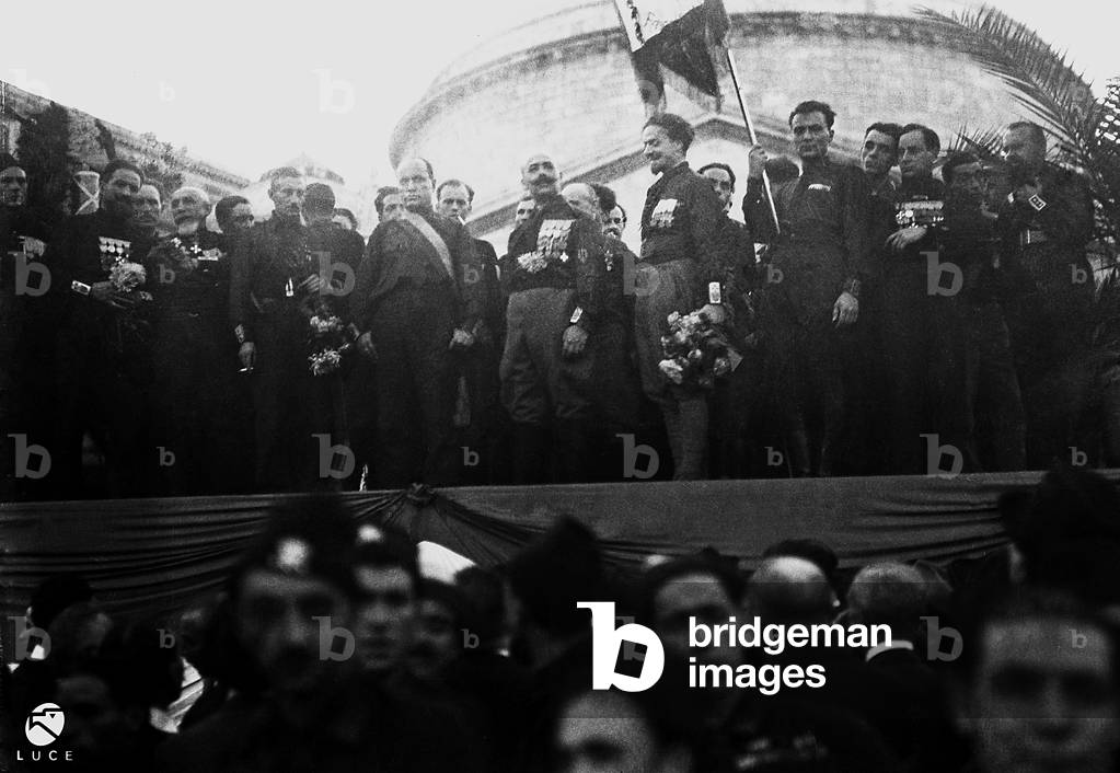 Mussolini on stage with De Vecchi and Balbo during the Fascist Gathering in Naples, 24/10/1922 (b/w photo)