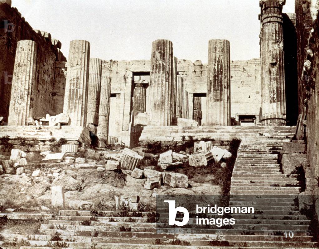 View of the propyleia on the acropolis of Athens. In the foreground many fragments of columns