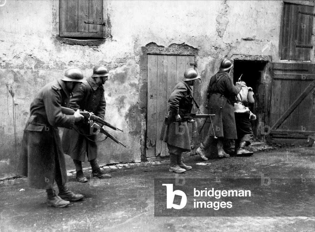 French soldiers inspecting some evacuated houses on the German border (b/w photo)
